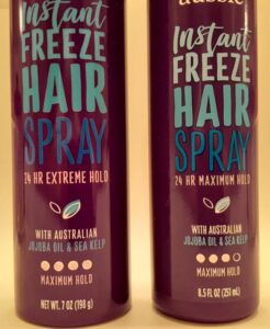 Aussie hair spray can and bottle
